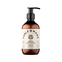 Fable & Mane Hydrating Conditioner bottle promotes nourishment for frizz-free hair