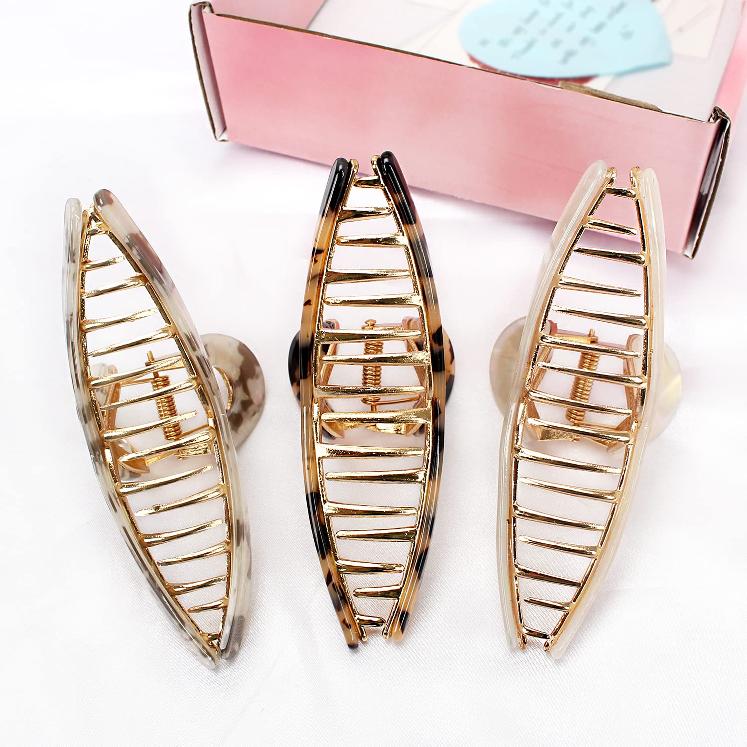 FAELBATY butterfly claw clip design highlights elegant curves and texture