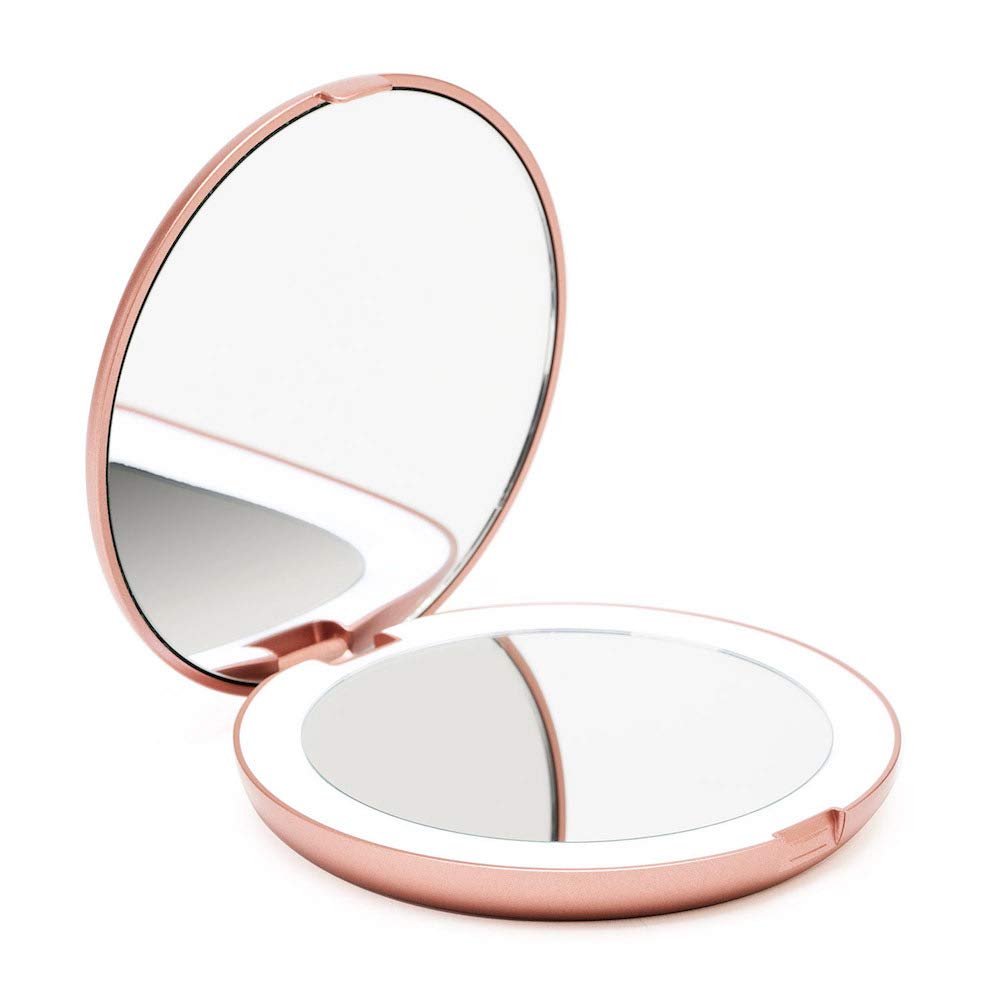 Fancii Lumi rose gold folding mirror closed for compact travel storage.