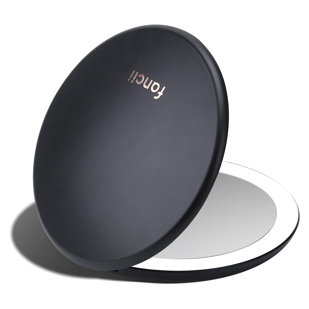 Fancii Taylor LED travel mirror in compact black for precise makeup on the go.