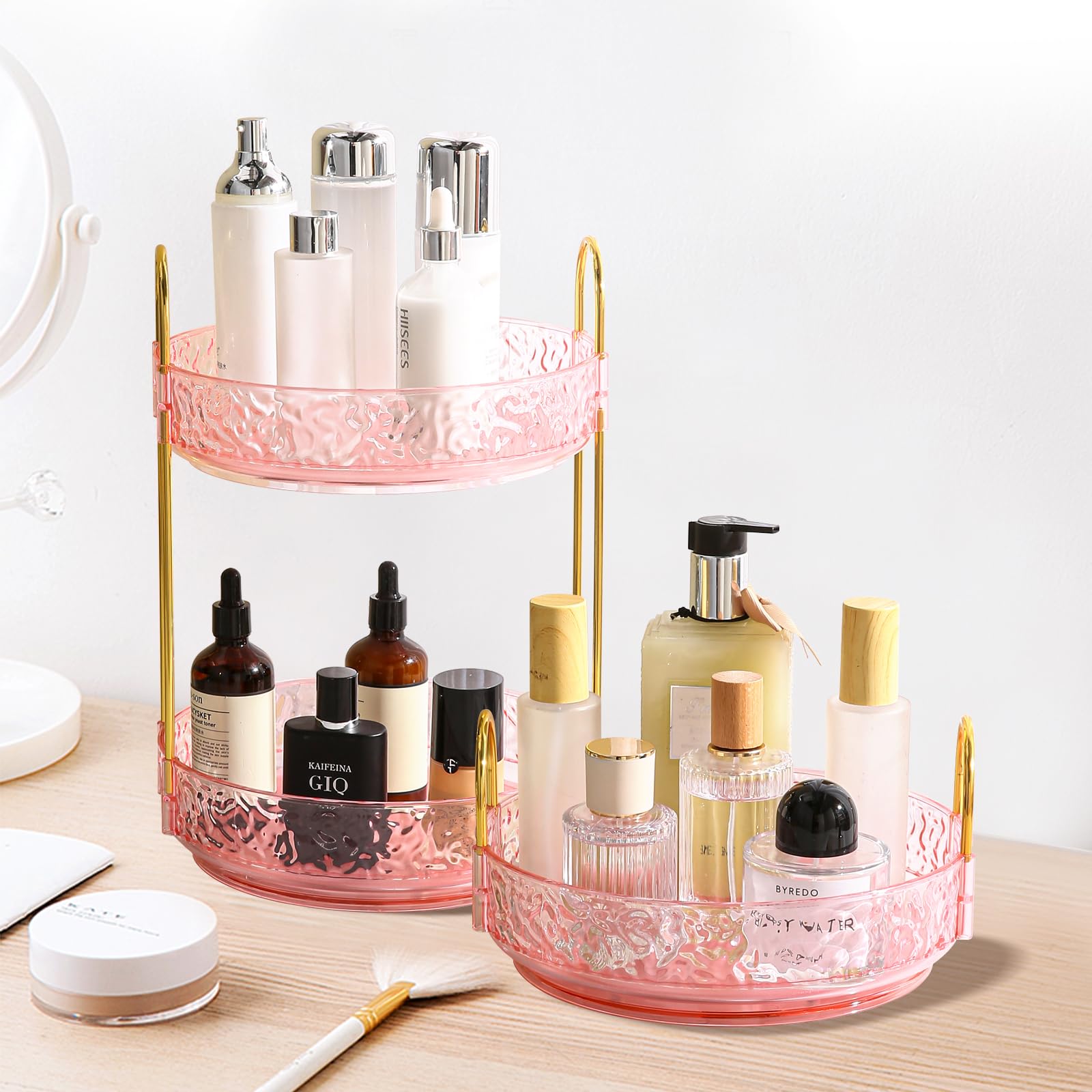 Fangoo pink lazy susan keeps skincare and makeup in view.