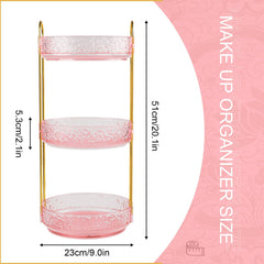 Fangoo pink rotating makeup organizer on vanity keeps cosmetics within reach.
