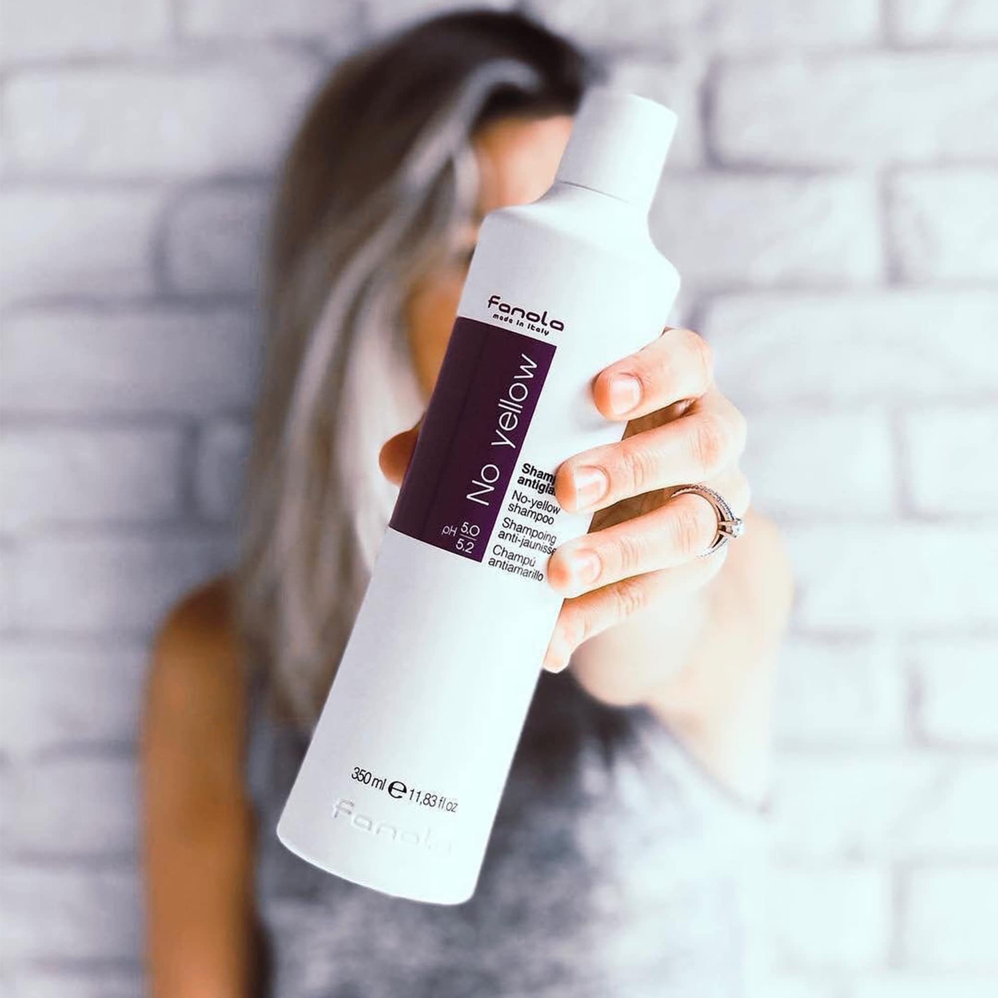 Fanola No Yellow application on damp hair with gentle massage