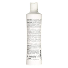 Fanola No Yellow Shampoo lather demonstrates color-depositing action for neutralizing yellow.