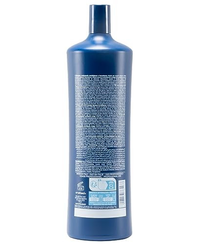 Fanola Wonder No Orange shampoo lather demonstrates blue toning for cooler blonde and brunette shades.