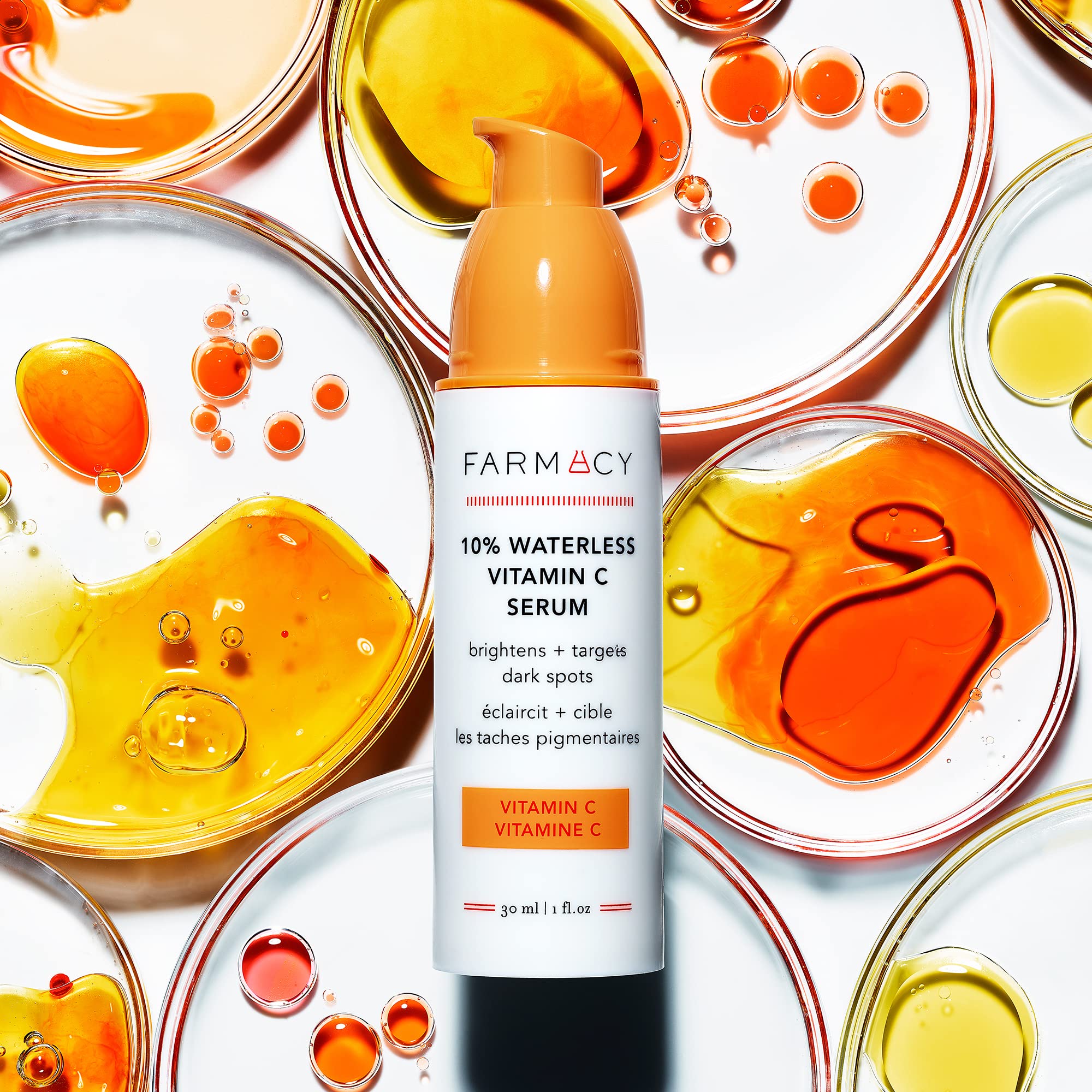 Farmacy 10% Vitamin C Serum dropper releasing serum for quick absorption.