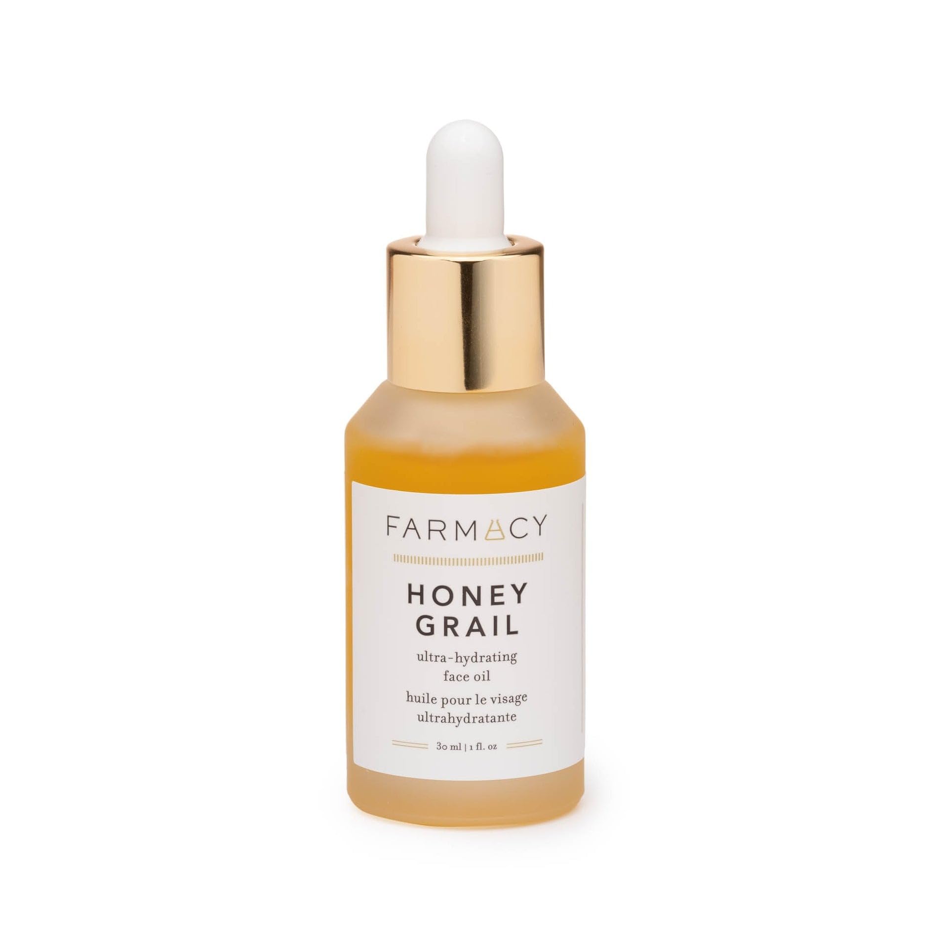 Packaging of Farmacy Honey Grail face oil on shelf.