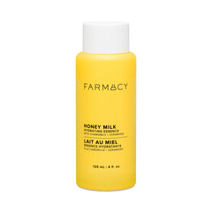 Farmacy Hydrating Essence bottle closeup showing a dewy base for calm skin.