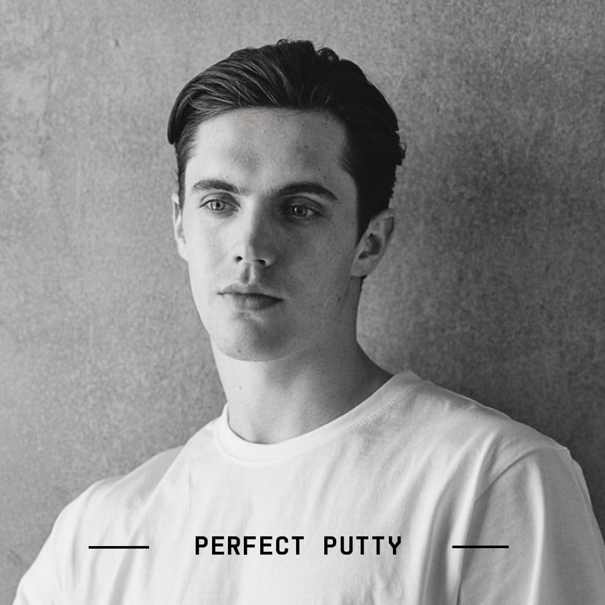 Fatboy Hair Perfect Putty rubbed between palms demonstrating easy application