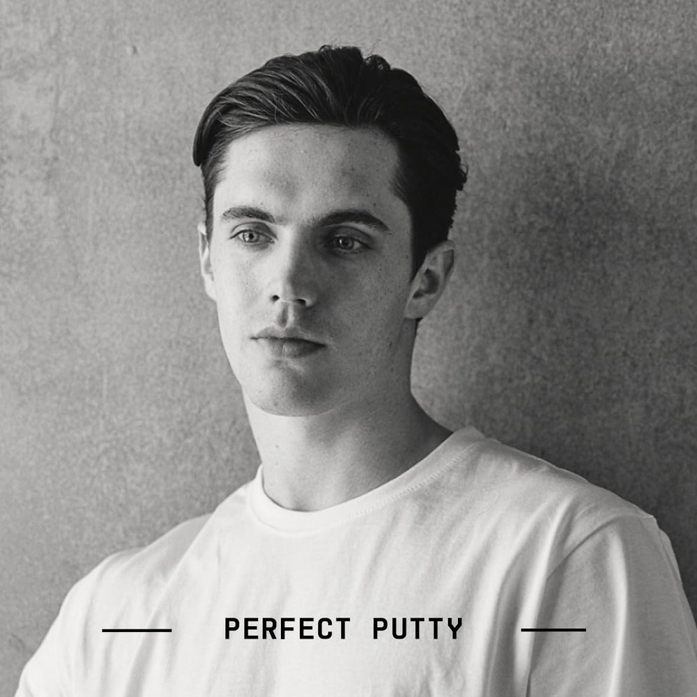 Fatboy Hair Perfect Putty rubbed between palms demonstrating easy application
