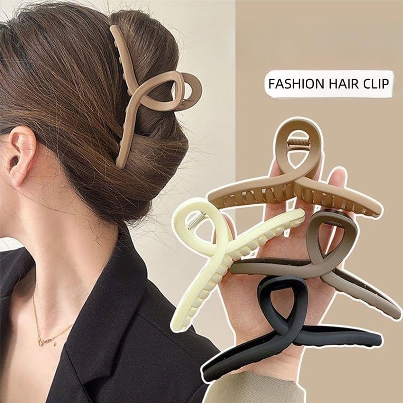 Faucye large claw clip khaki back view showing reliable hold all day.