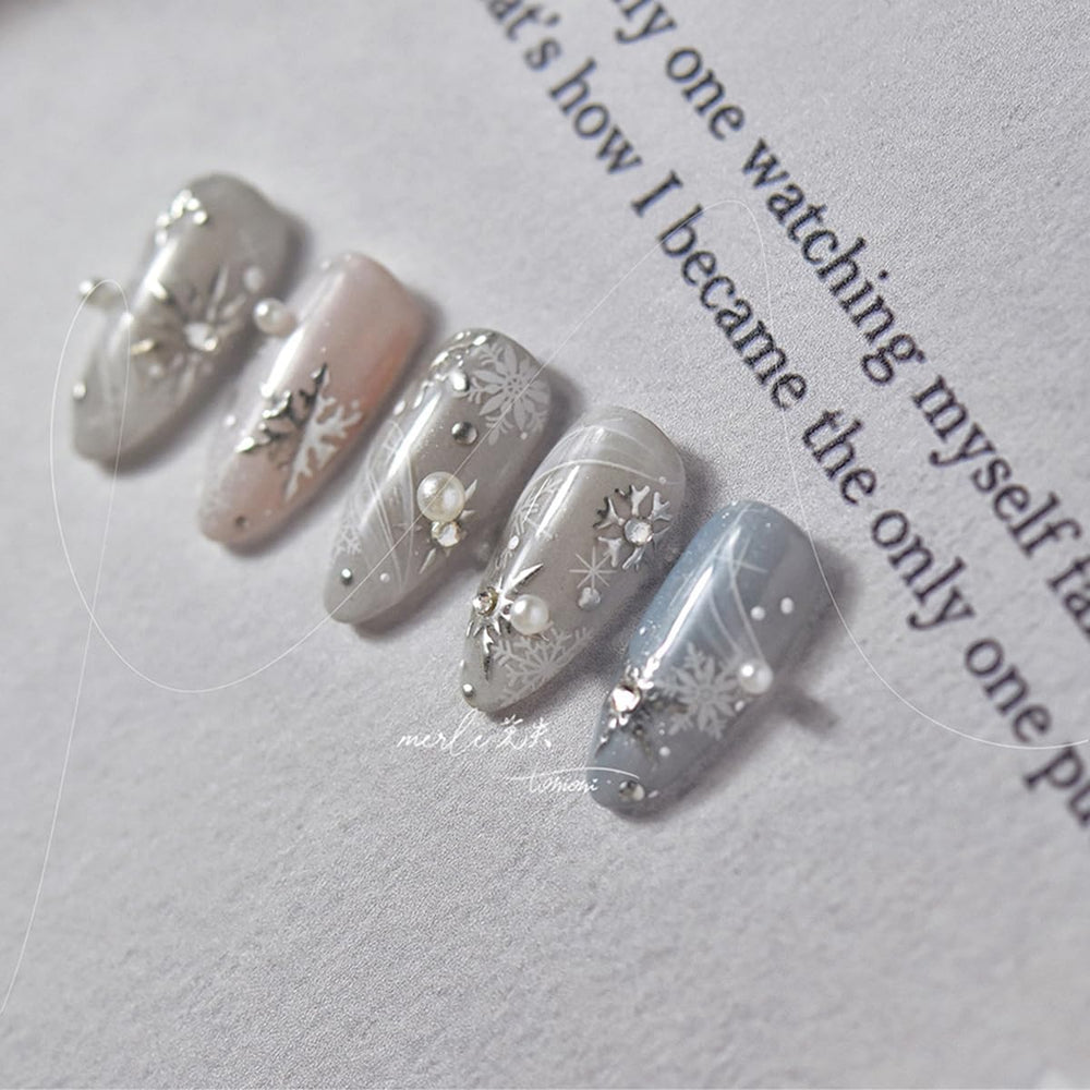 FBABFBUO snowflake nail stickers uv-nail compatible for quick holiday manicure.