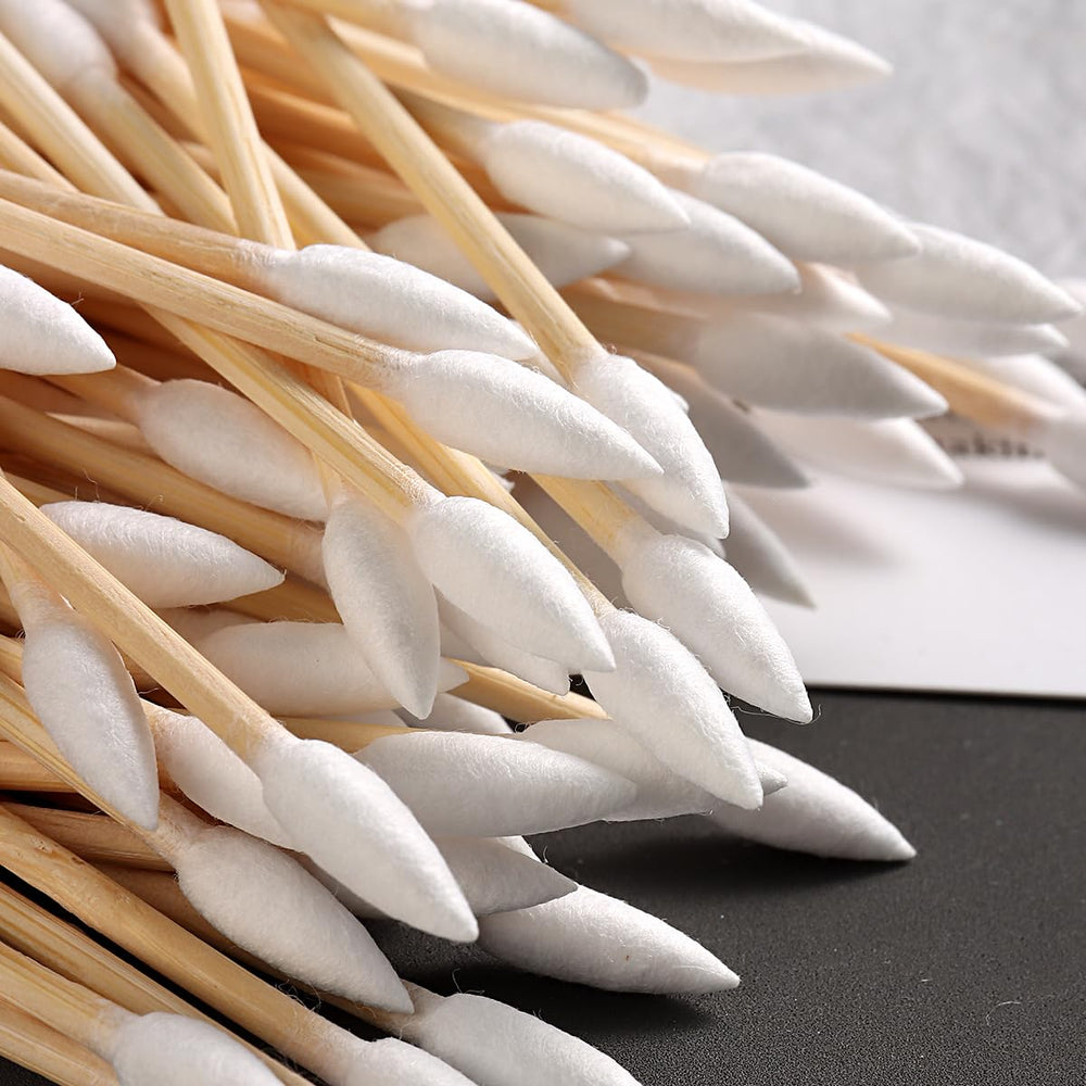 Fcozpjk swabs cleaning dust from keyboards and electronics with precision.