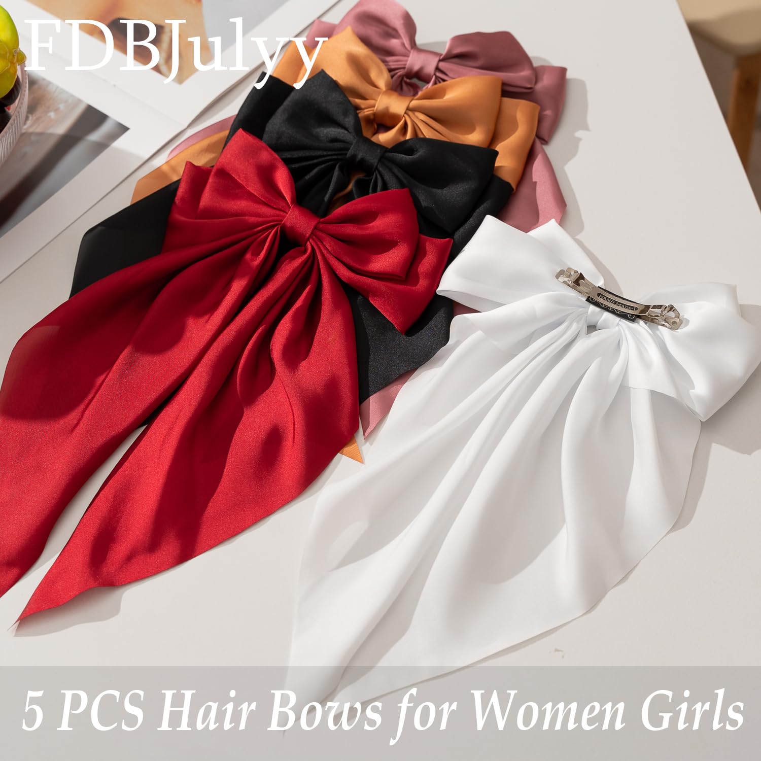 FDBJulyy all-hair-types bow clip in use for curls and straight hair.