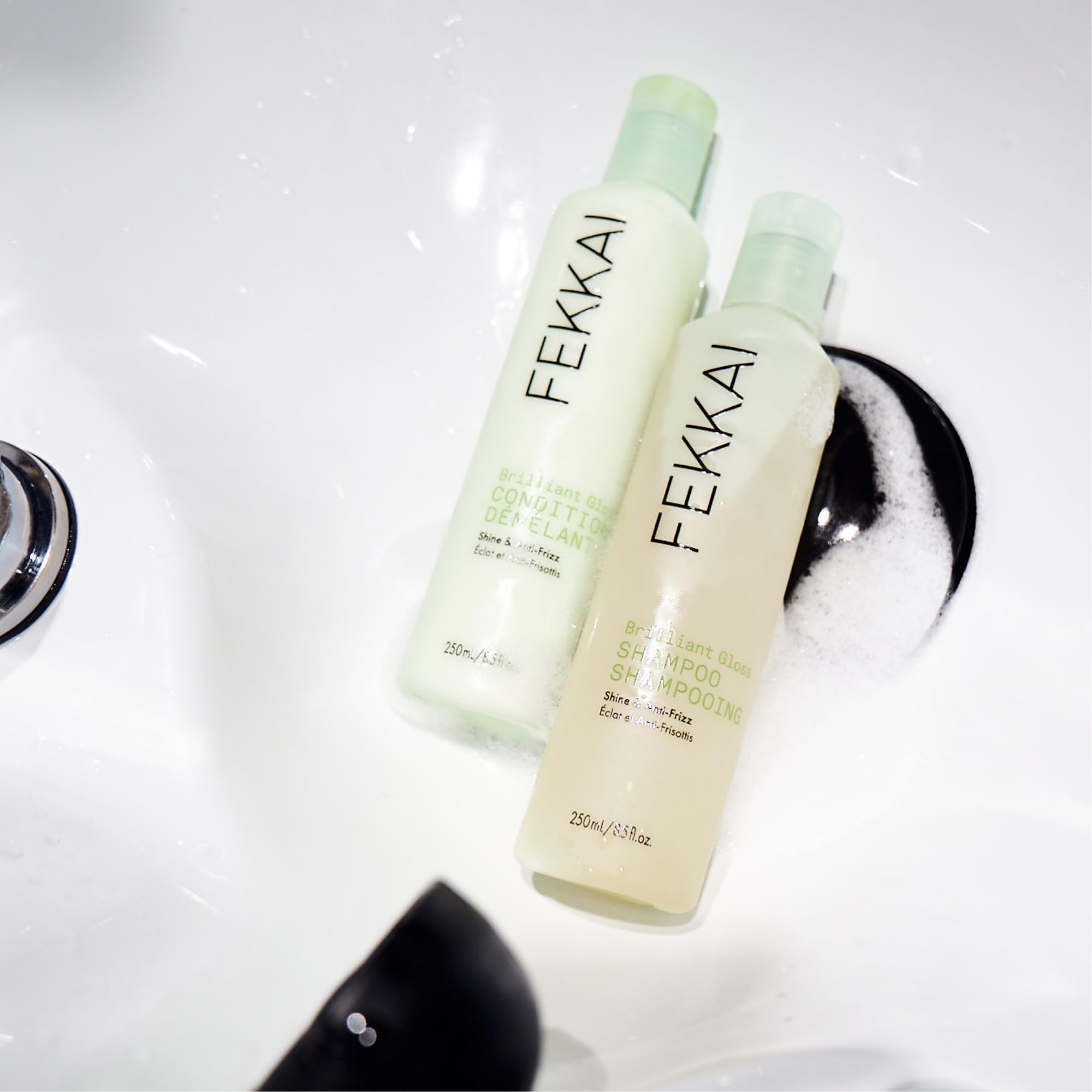 Fekkai Brilliant Gloss Conditioner olive oil drops highlight nourishing shine.