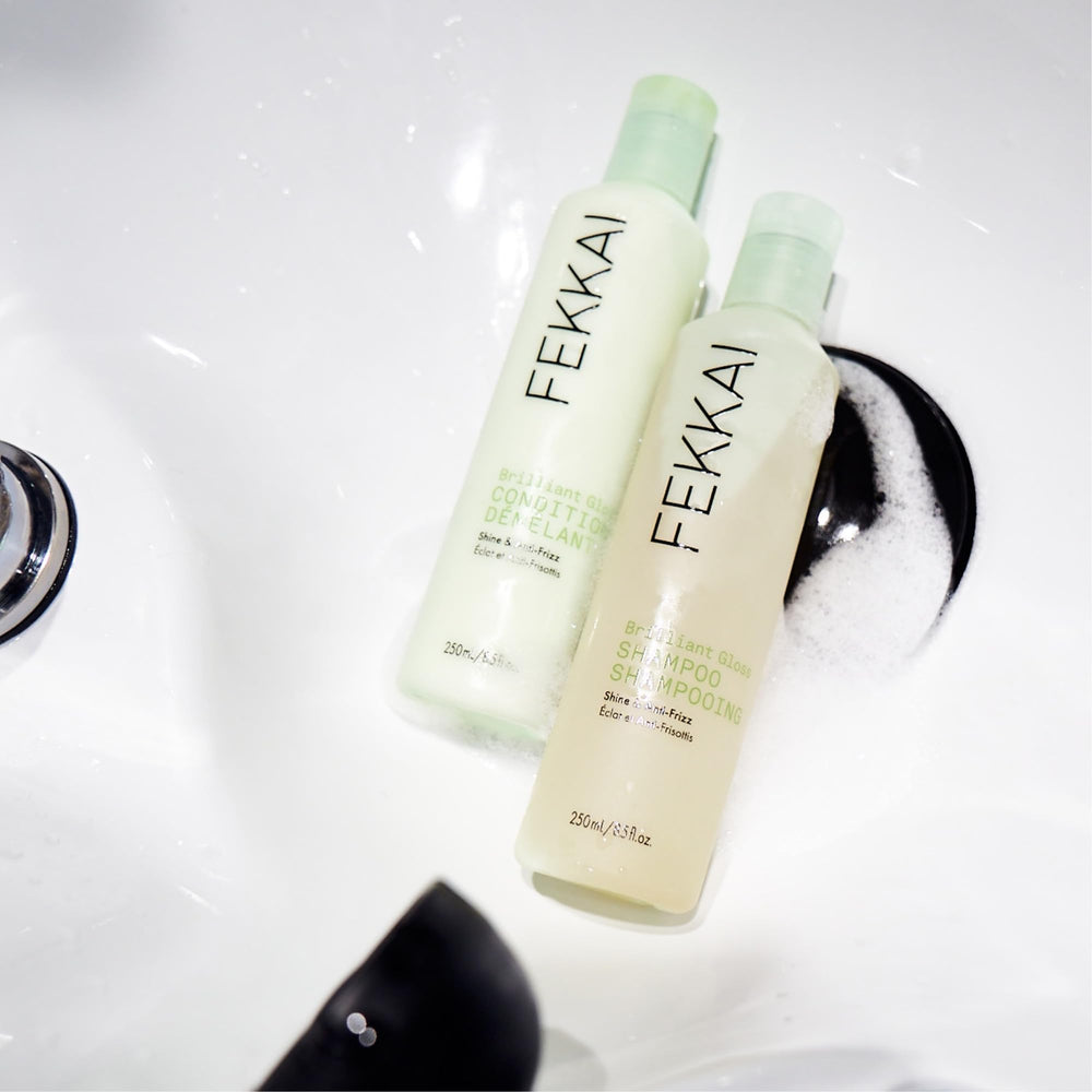Fekkai Brilliant Gloss Conditioner olive oil drops highlight nourishing shine.