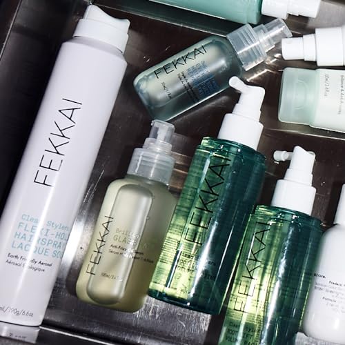 Fekkai Brilliant Gloss Glass Hair Serum application hands demonstrates easy, even distribution for frizz control.
