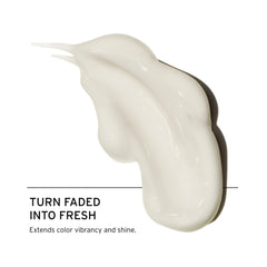 Fekkai conditioner being applied for color-treated hair shine and protection.