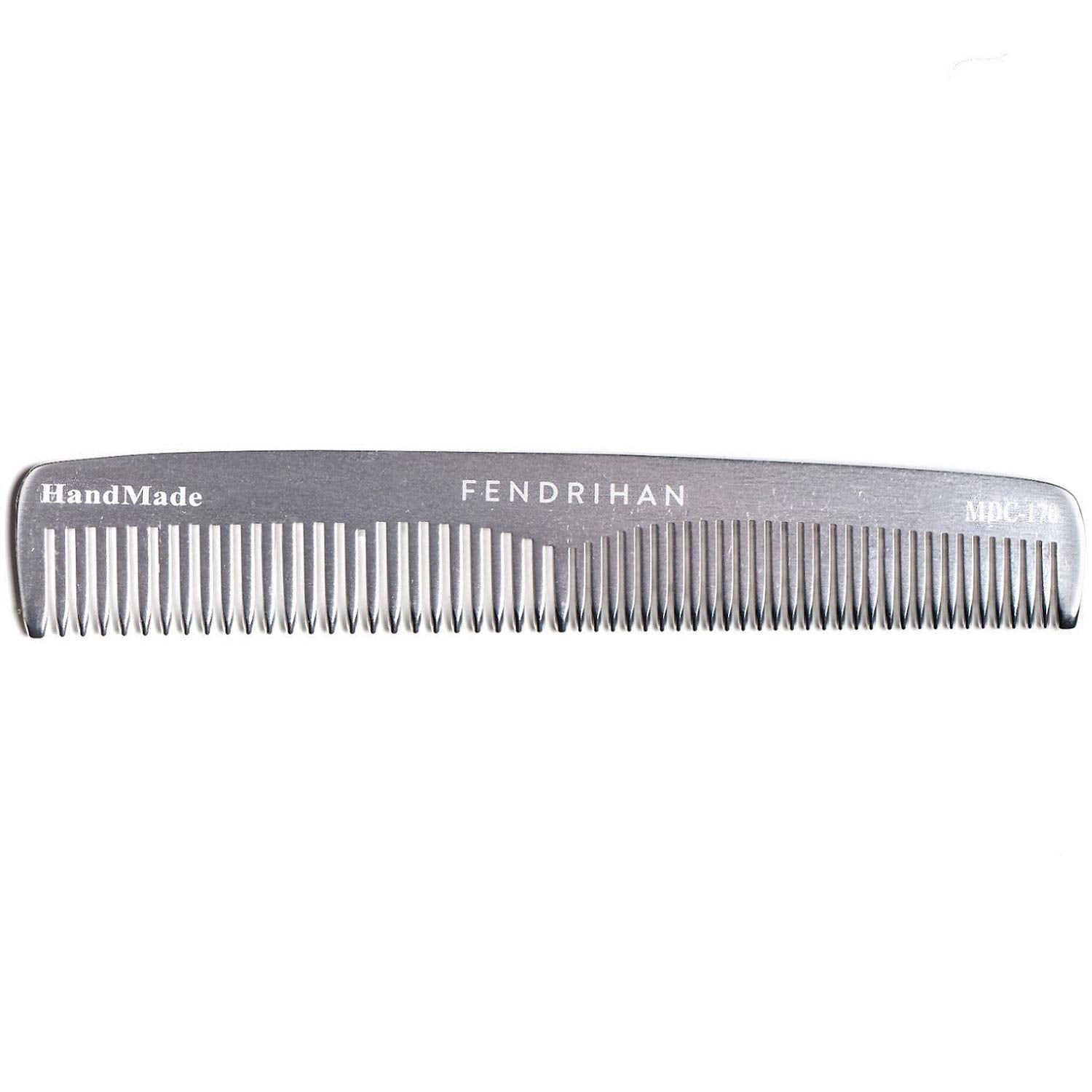 Fendrihan double-tooth comb close-up highlights rounded teeth for gentle scalp massage.