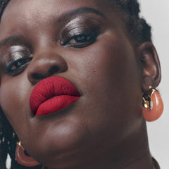 Fenty Icon Velvet Lipstick rich color swatch demonstrates pigment across skin tones.