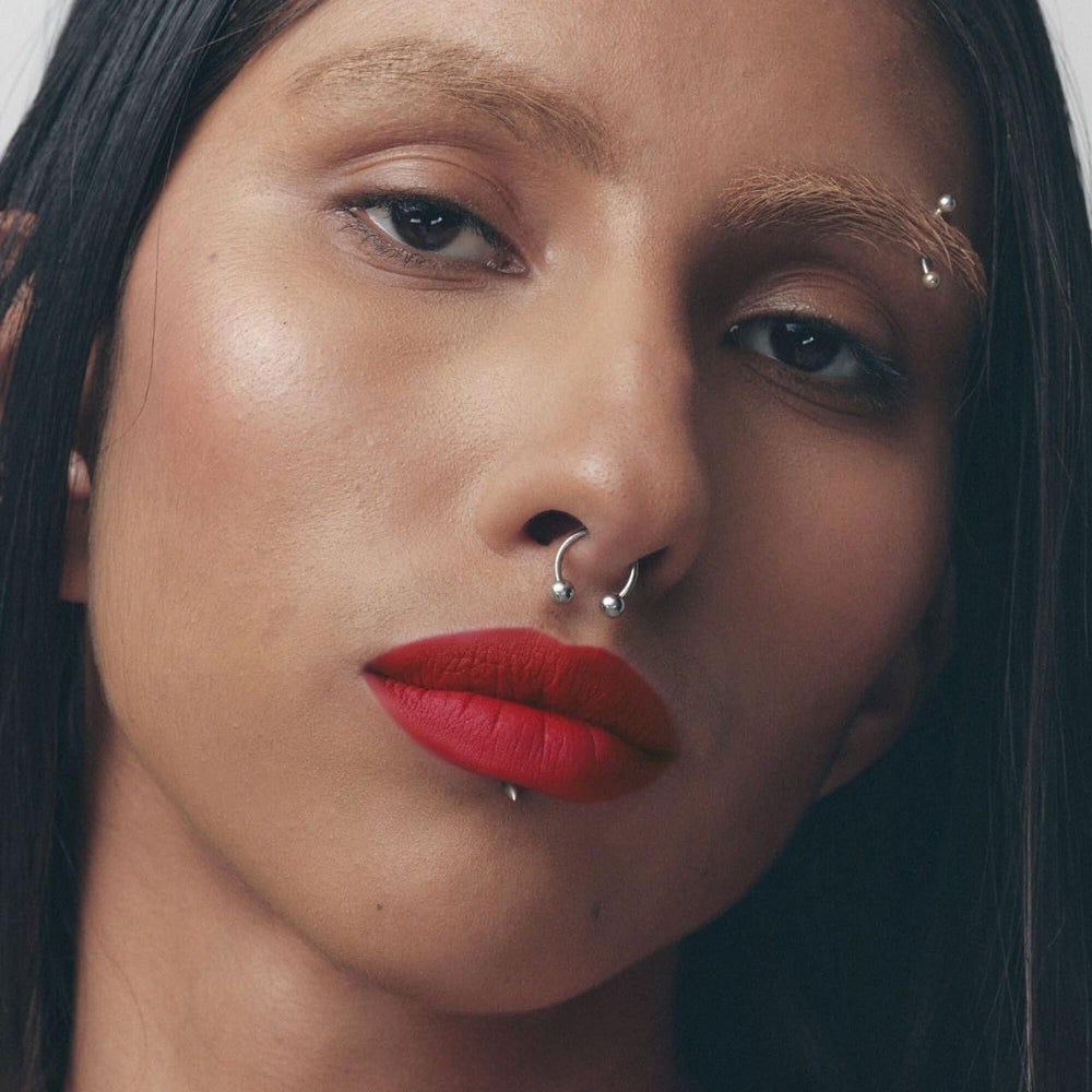 Fenty Icon Velvet Lipstick velvet-matte finish on lips for a sophisticated look.