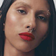 Fenty Icon Velvet Lipstick velvet-matte finish on lips for a sophisticated look.