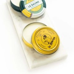 Feret Le Baume Rose Poudre vintage tin packaging evokes Parisian charm.