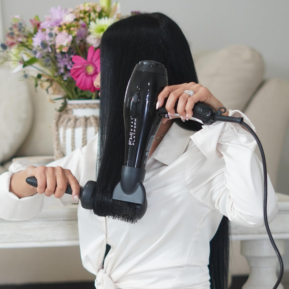 FHI Heat 2000 dryer in use for all hair types styling.