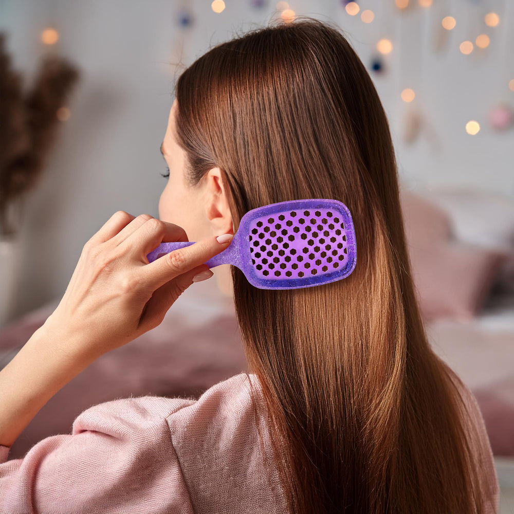 FHI Heat UNbrush Mini detangles wet or dry hair for versatile use