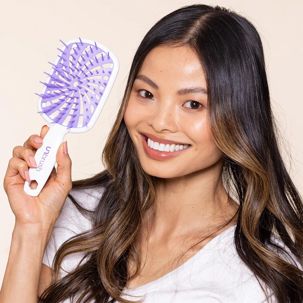 FHI Heat UNbrush Plus brushing in action on tangled hair