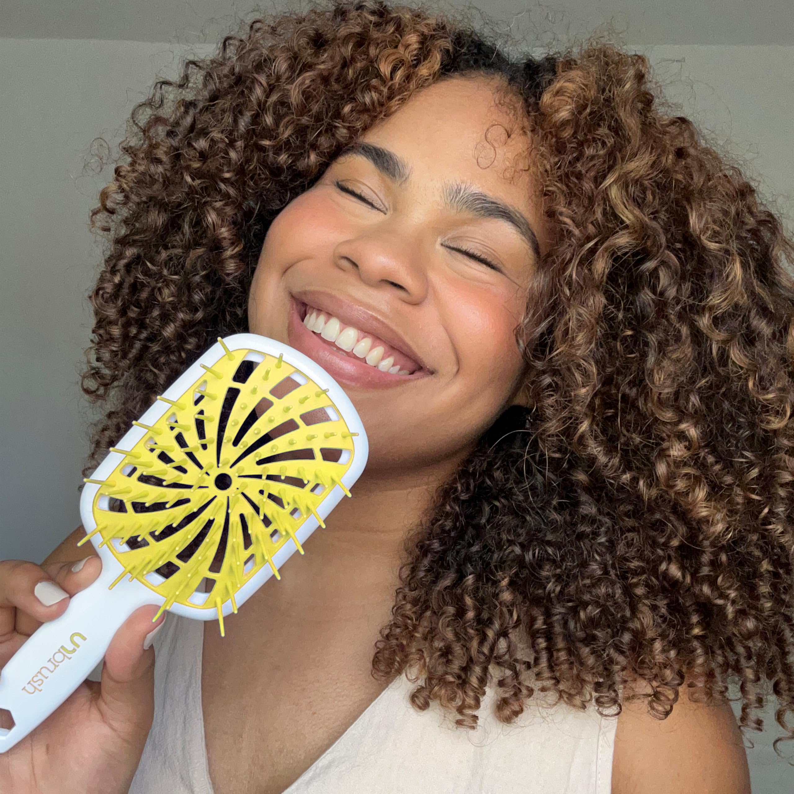 FHI Heat UNbrush Plus works on dry hair for quick, tangle-free grooming and styling prep