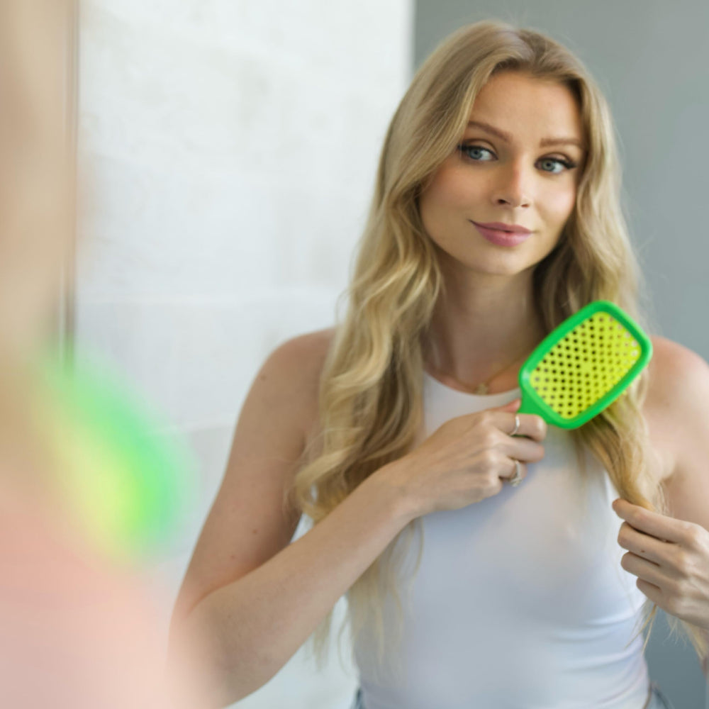 FHI Heat UNbrush travel-friendly brush fits bags for on-the-go detangling