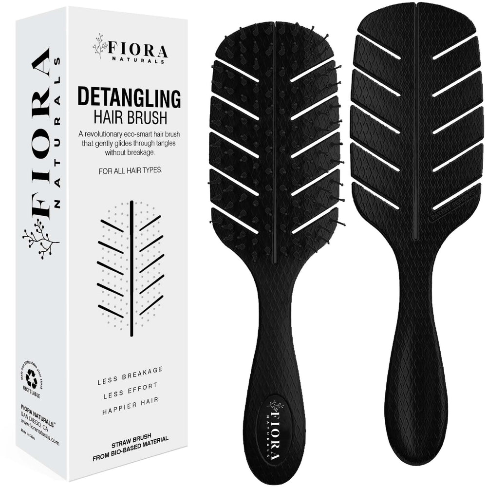 Fiora Naturals Detangler Brush close-up shows ultra-soft bristles for gentle detangling.