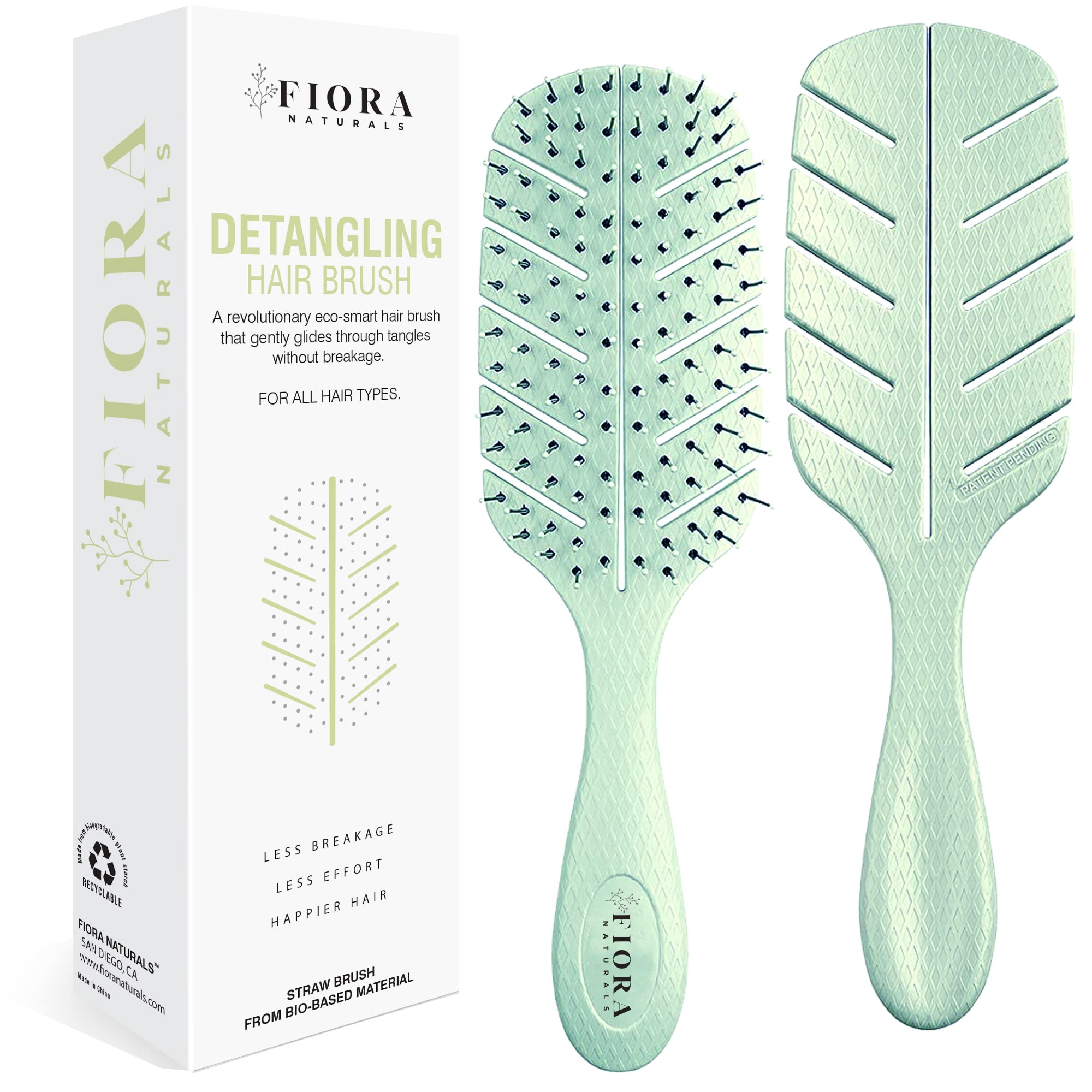 Fiora Naturals Detangler Brush front view demonstrating gentle detangling with no pull action for all hair types.
