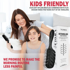 Fiora Naturals Detangler Brush on wet hair demonstrating knot removal without breakage.