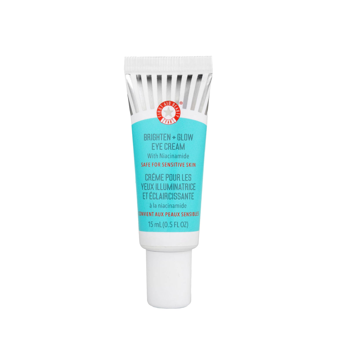 First Aid Beauty Brighten Glow Eye Cream tube application showing instant glow and hydration
