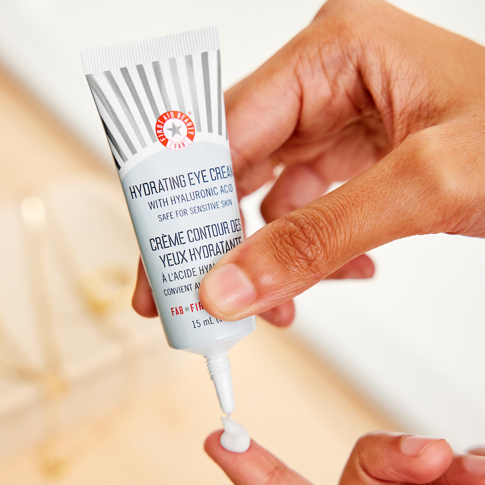 First Aid Beauty eye cream highlighting caffeine and cucumber extract for day and night hydration