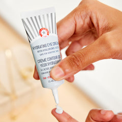First Aid Beauty eye cream highlighting caffeine and cucumber extract for day and night hydration