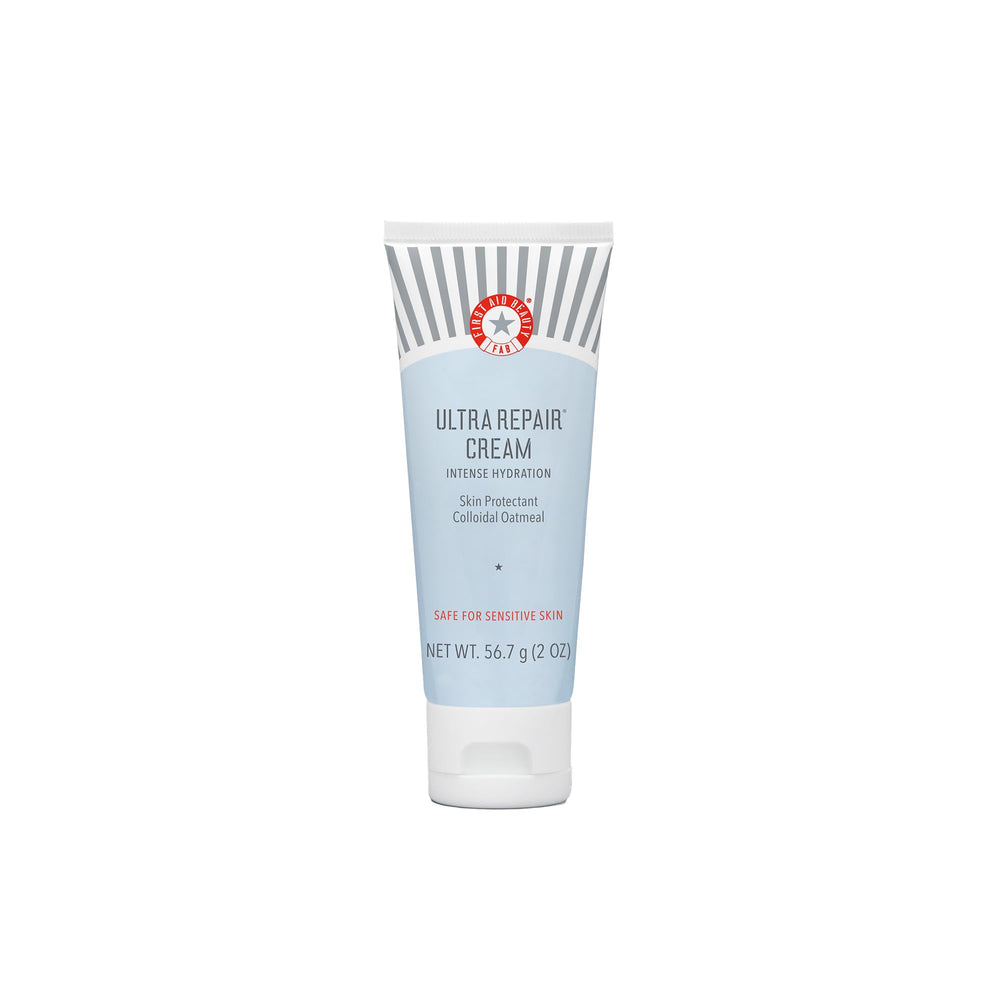 First Aid Beauty Ultra Repair Cream jar closeup demonstrates whipped texture for lasting hydration.