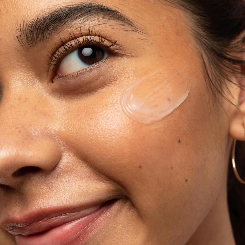 First Aid Beauty Coconut Water Cream being applied for quick absorption