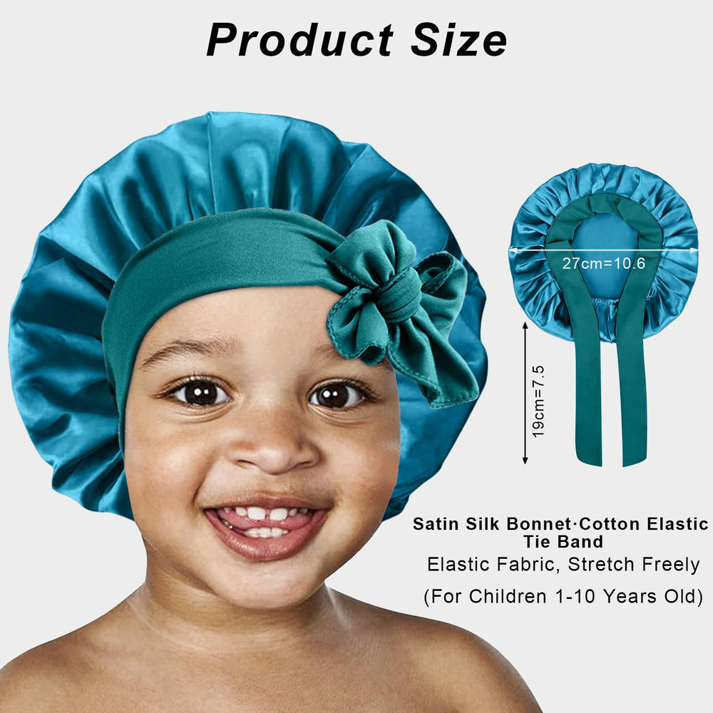 FIRSTPELLA kids silk bonnet black-band wear demonstrates secure fit.