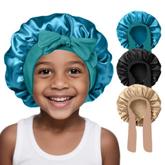 FIRSTPELLA kids silk bonnet peacock blue closeup shows moisture-friendly satin for sleeping.