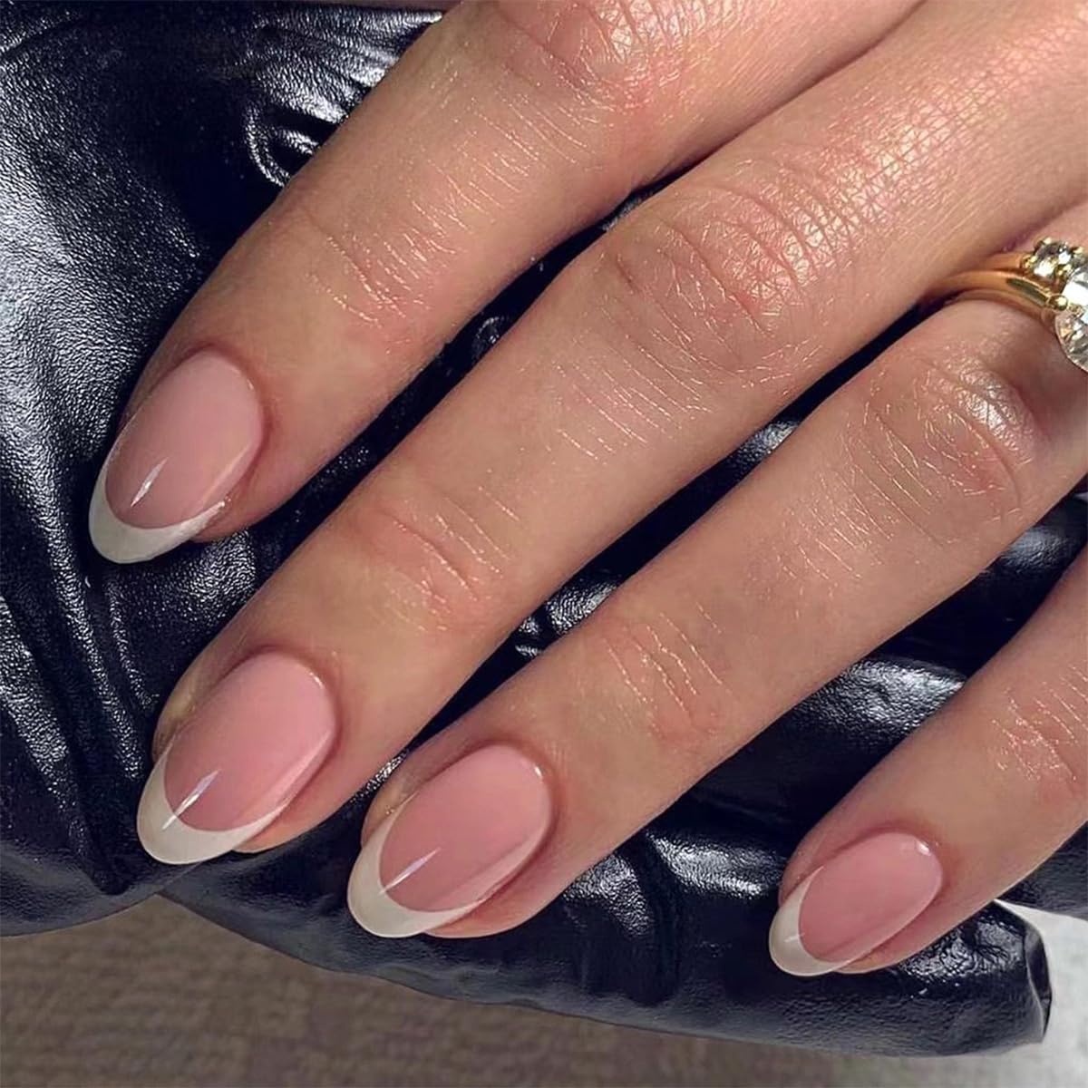 FJSMTOPl almond nails with white French tip for DIY home manicure.