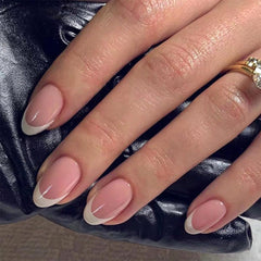 FJSMTOPl almond nails with white French tip for DIY home manicure.
