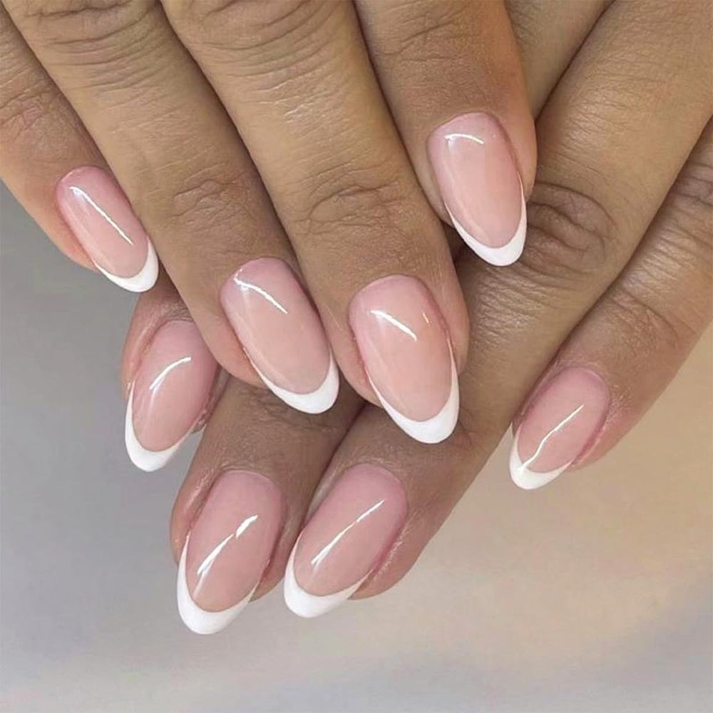 FJSMTOPl French Tip press-on nails in short oval shape for quick chic manicure.