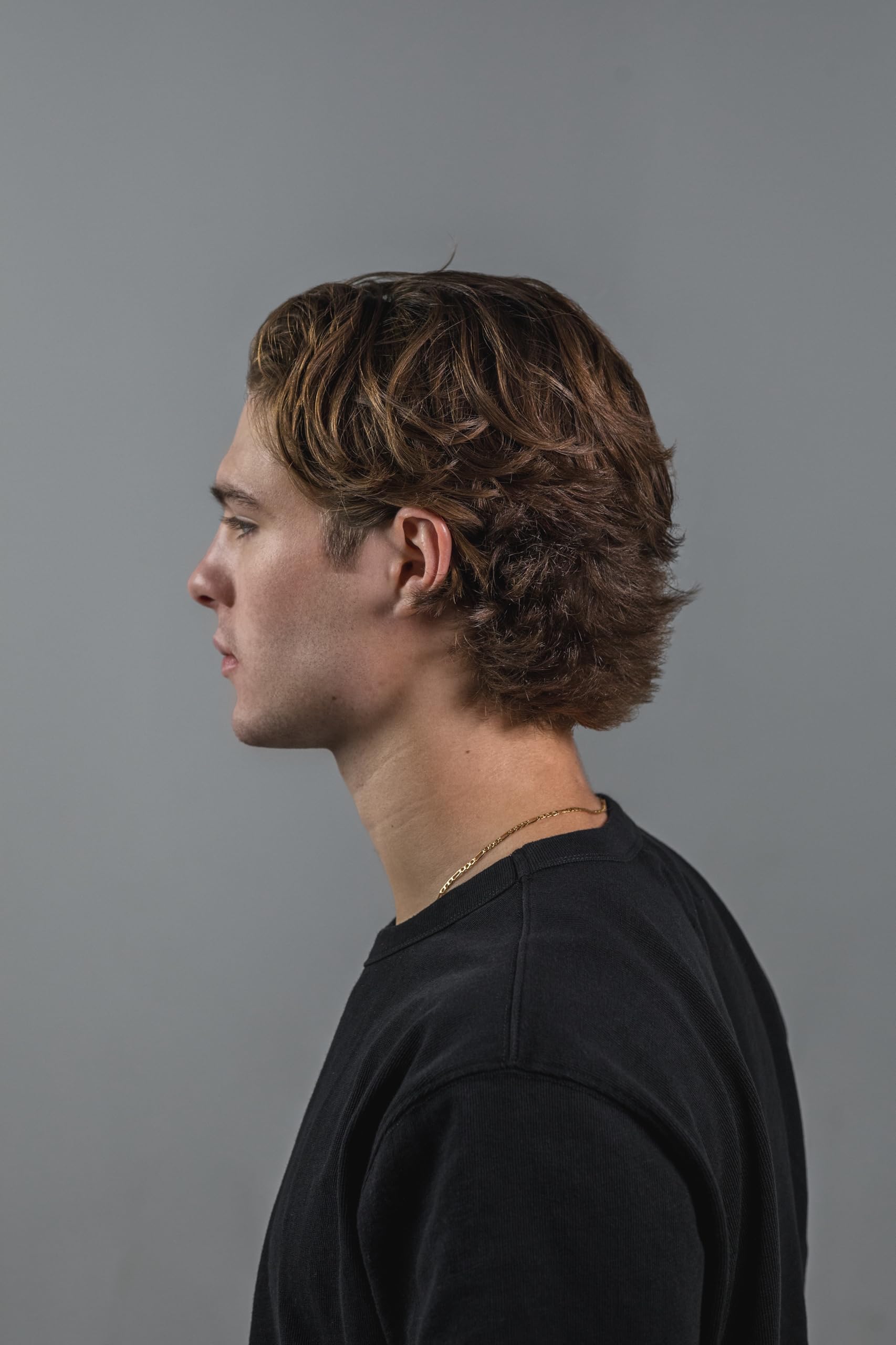 Flow Bros hair clay texture close-up highlights natural volume and texture.