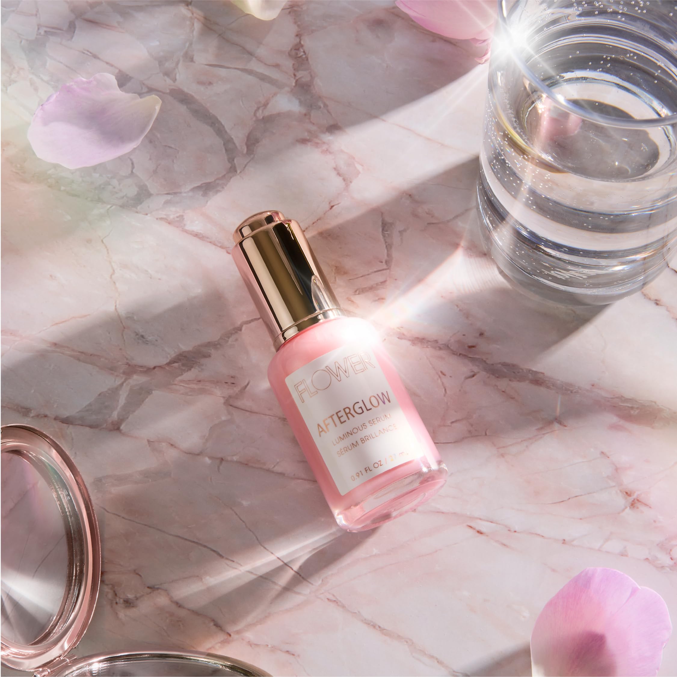 FLOWER Beauty Afterglow serum ingredients highlight hyaluronic acid and niacinamide