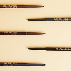 Flower Beauty Forever Wear Eyeliner Onyx application demonstrates smooth glide for precise line.
