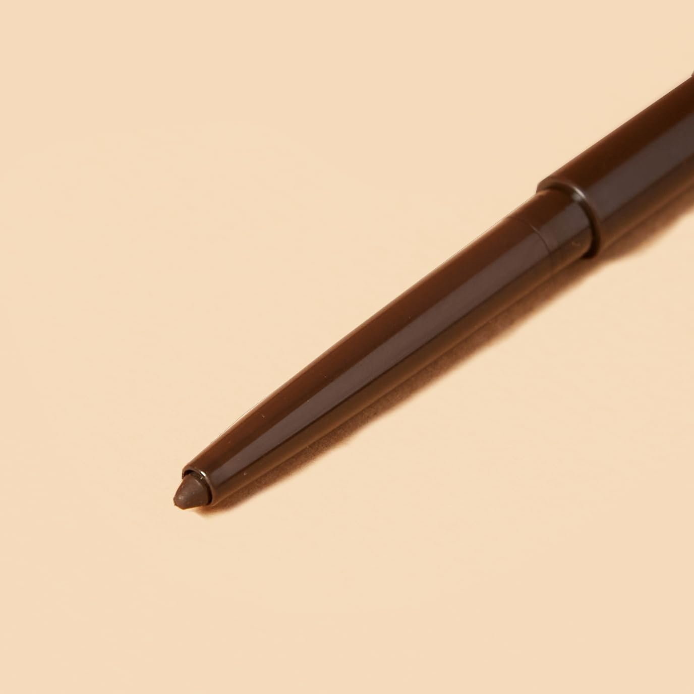 Flower Beauty Forever Wear Eyeliner Onyx close-up highlights sleek, smudge-resistant finish.