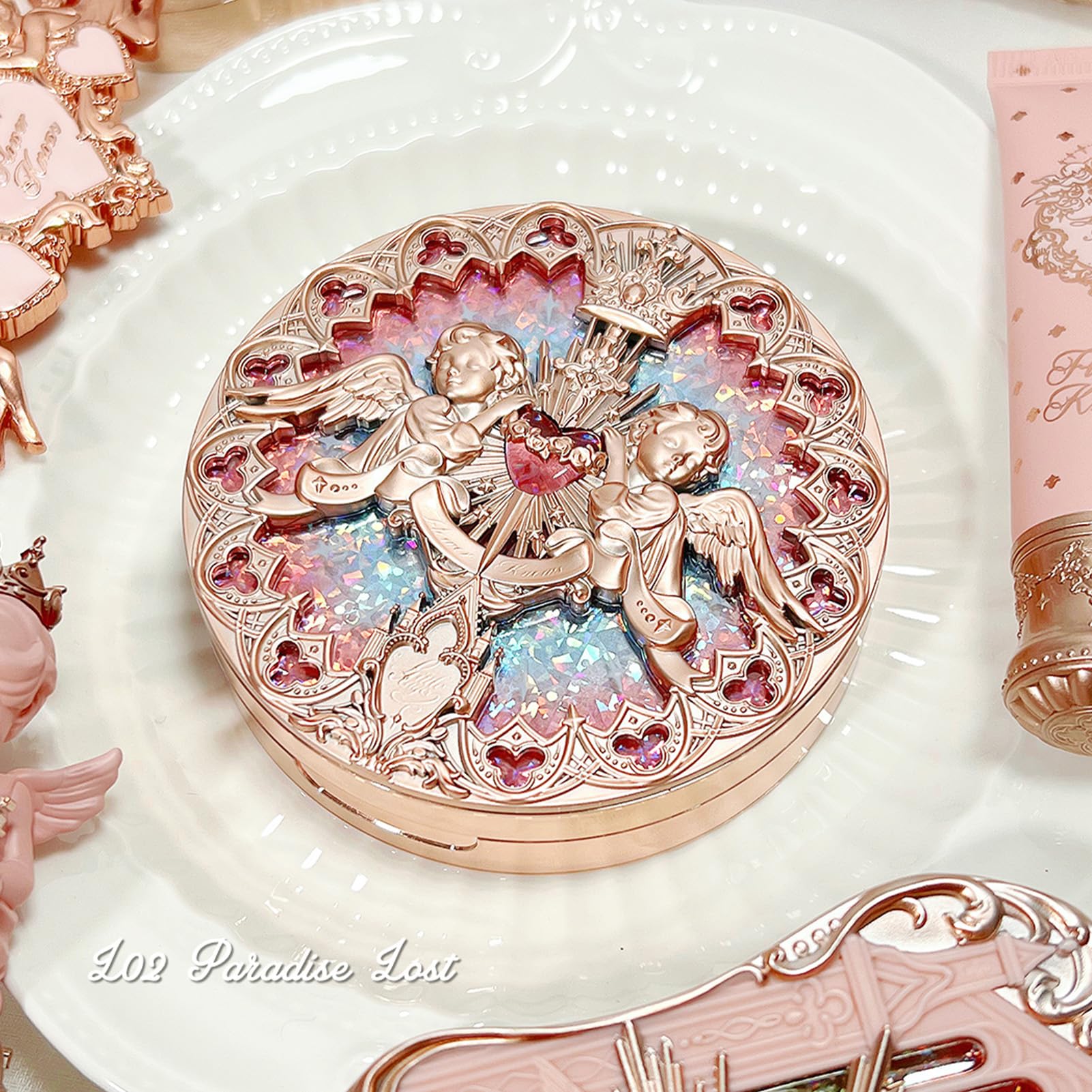 Flower Knows Little Angel embossed highlighter L03 Chanting Anthem shade delivers ethereal shimmer.
